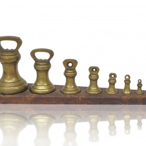 #59828 -  Set of 7 antique brass weights on original wooden base