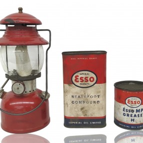 Coleman lantern and Esso garage cans