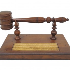 #63014 -  Antique wooden judge’s gavel displayed on its stand.