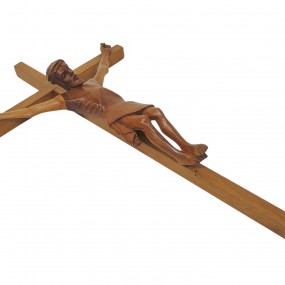 Antique wooden crucifix featuring a hand-carved figure of Christ.