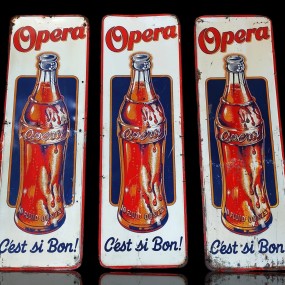 Vintage metal Opera advertising sign 
