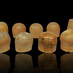 Set of turned wooden millinery heads, hats form 