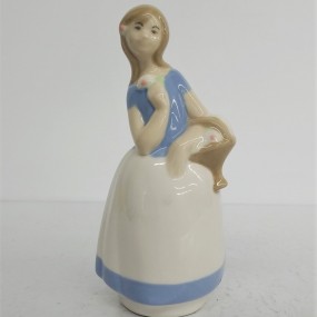 Little porcelain figurine Ladro