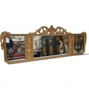 Grand miroir antique doré à cadre sculpté