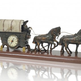 Vintage clock deciorated with metal horses 