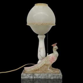 Art Deco alabaster lamp with peacock base, broken beak
