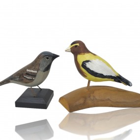 Folk art wooden birds sculptures