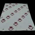 Handmade quilt with red geometric pattern. - 1
