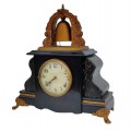 Antique mantel clock with gong, black case and gilt accents. - 1