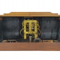 Vintage Ingraham mantel clock in wood, featuring architectural details - 2