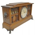 Vintage Ingraham mantel clock in wood, featuring architectural details - 3