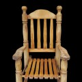 Handcrafted solid wood rocking chair with warm rustic appeal. - 3