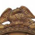 Elegant Federal-style oval mirror featuring a gilded frame topped with an eagle (broken beak) - 2