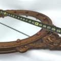 Elegant Federal-style oval mirror featuring a gilded frame topped with an eagle (broken beak) - 4