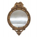 Elegant Federal-style oval mirror featuring a gilded frame topped with an eagle (broken beak) - 1