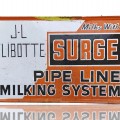 Vintage Surge advertising sign  - 1