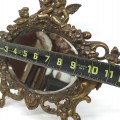 Miroir sur pied décoré de chérubins - 2