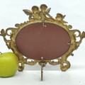 Miroir sur pied décoré de chérubins - 3