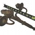 Pair of antique two-arm wall sconces featuring ornate classical detailing. - 2