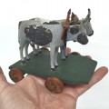 Little wooden beef on wheels toy  - 3