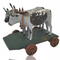 Little wooden beef on wheels toy  - 1