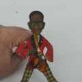 Wind-up tin saxophone player, 1940s charm - 4
